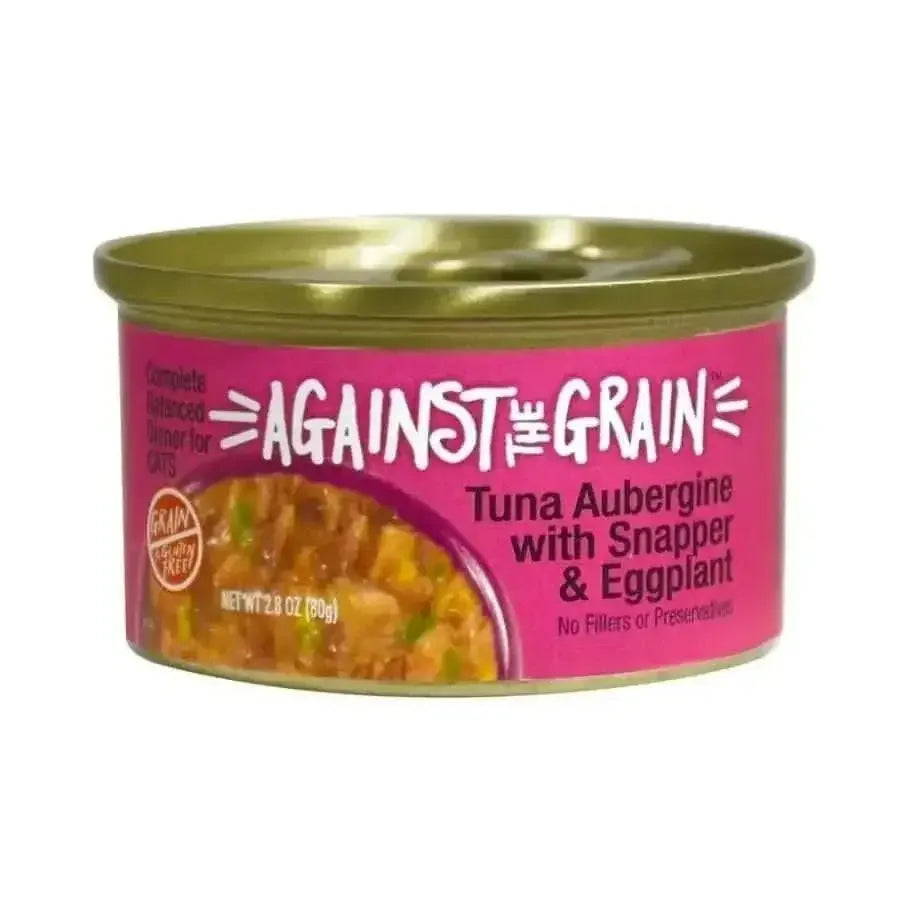 A can of Against the Grain Tuna Aubergine With Snapper & Eggplant Wet Cat Food, 2.8 oz, features a pink label and gold lid. This grain-free food provides a complete, balanced meal for cats with no fillers or preservatives.