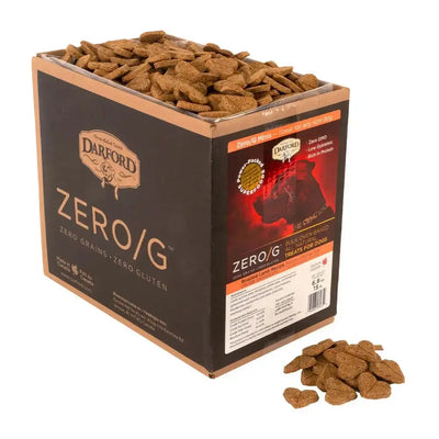A large 15 lb box of Darford® Zero/G Roasted Lamb Dog Treats with brown, heart-shaped treats spilling out. The box highlights Zero Grains, Zero Gluten and features the Darford brand and product details.