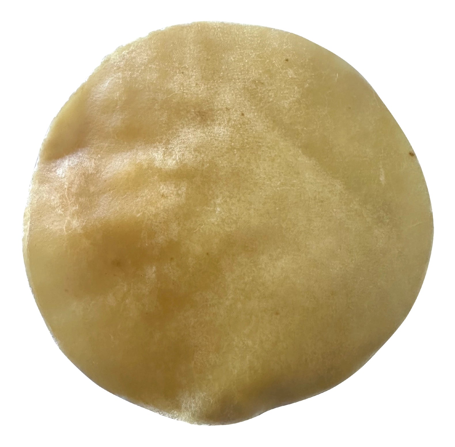 A single, round, tan-colored water buffalo collagen disc dog chew on a white background.