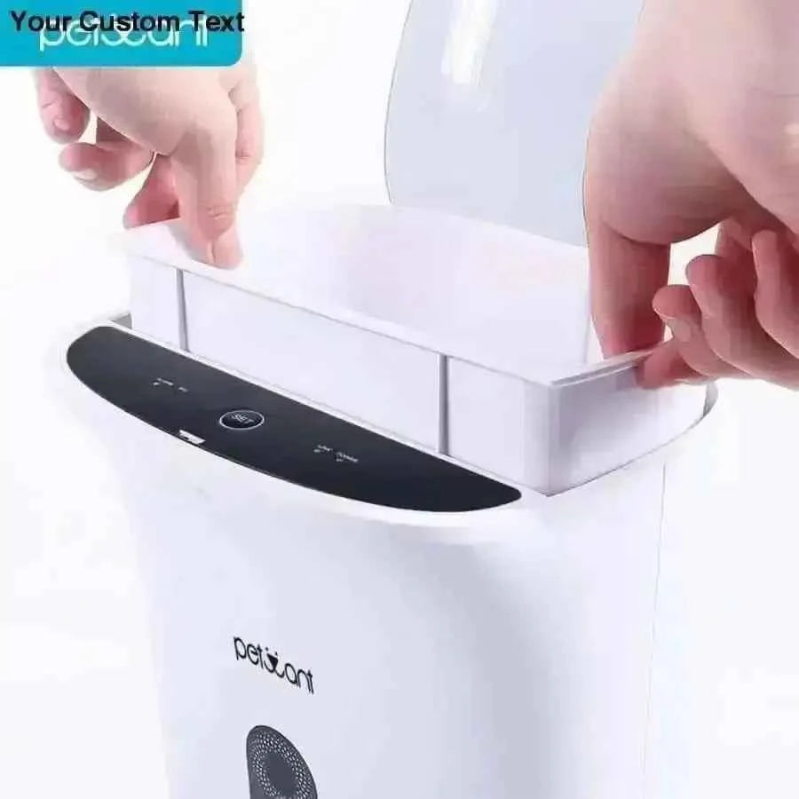 User removing the food container from the top of the smart pet feeder.