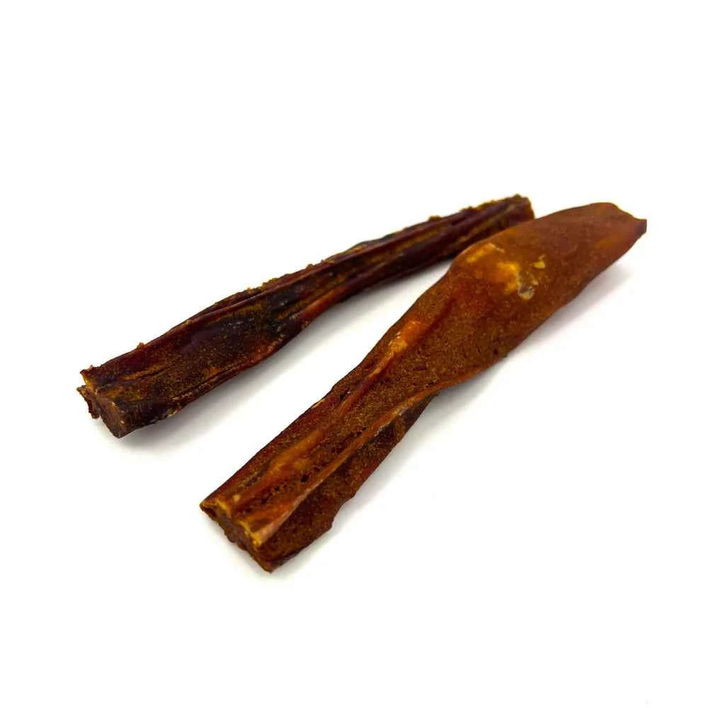 Two long, dark brown pumpkin-infused bully sticks for dogs on a plain white background.