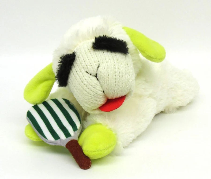 Soft plush lamb dog toy with bright green ears holding a green-striped pickleball paddle for playful chewing.
