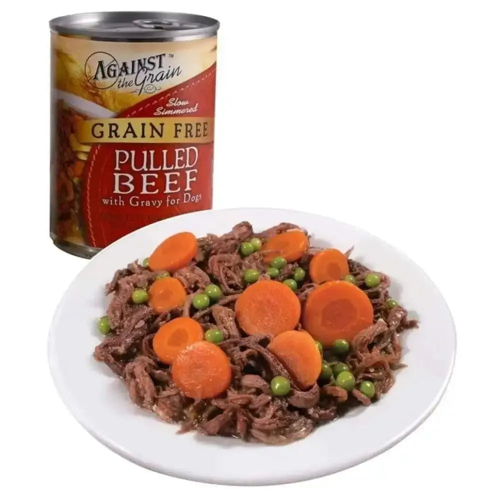 A case of 12 Against the Grain Hand Pulled Beef Dog Food 12-oz cans is shown beside a plate of shredded beef, carrots, and peas—ideal for balanced nutrition for your dog.
