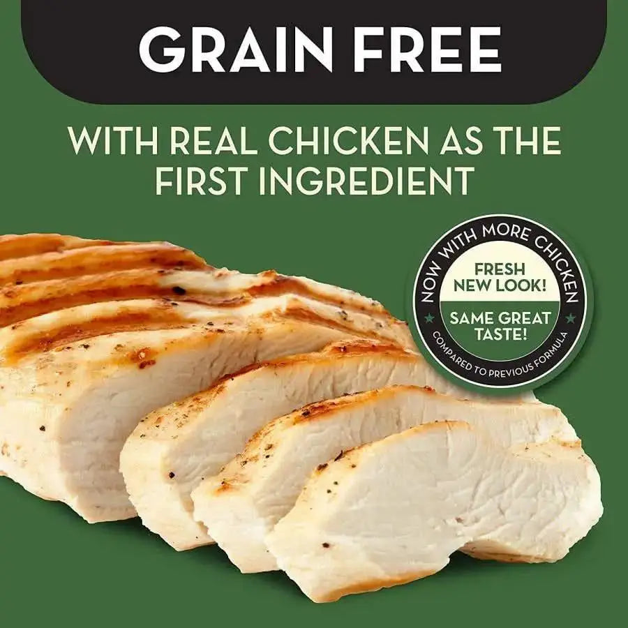Sliced grilled chicken breast on a green background with text: “AvoDerm Grain Free Chicken and Vegetables Dry Dog Food – With real chicken as the first ingredient” and a label: “Now with more chicken! Fresh look, same great taste!”.