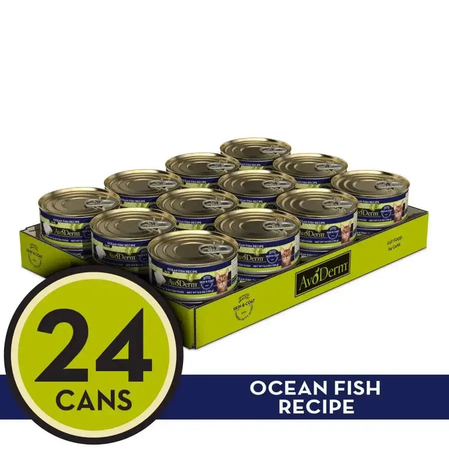 AvoDerm Natural Ocean Fish Formula Wet Cat Food, 24 cans (5.5 oz each), comes in a yellow and blue tray labeled 24 CANS and OCEAN FISH RECIPE, offering a nutritious meal for cats from AvoDerm.