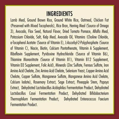 The ingredients for AvoDerm Natural Original Lamb Meal & Brown Rice Recipe Dry Dog Food are shown on a tan background with a burgundy border, highlighting lamb meal, brown rice, meats, grains, fish, veggies, vitamins, minerals, probiotics & natural flavors.