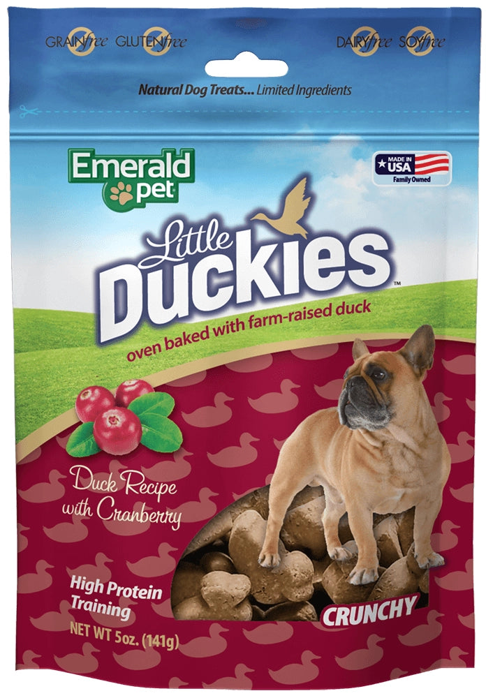 Emerald Pet Grain-Free Little Duckies dog treats, 5 oz bag, featuring crunchy duck and cranberry recipe with a dog on the fro