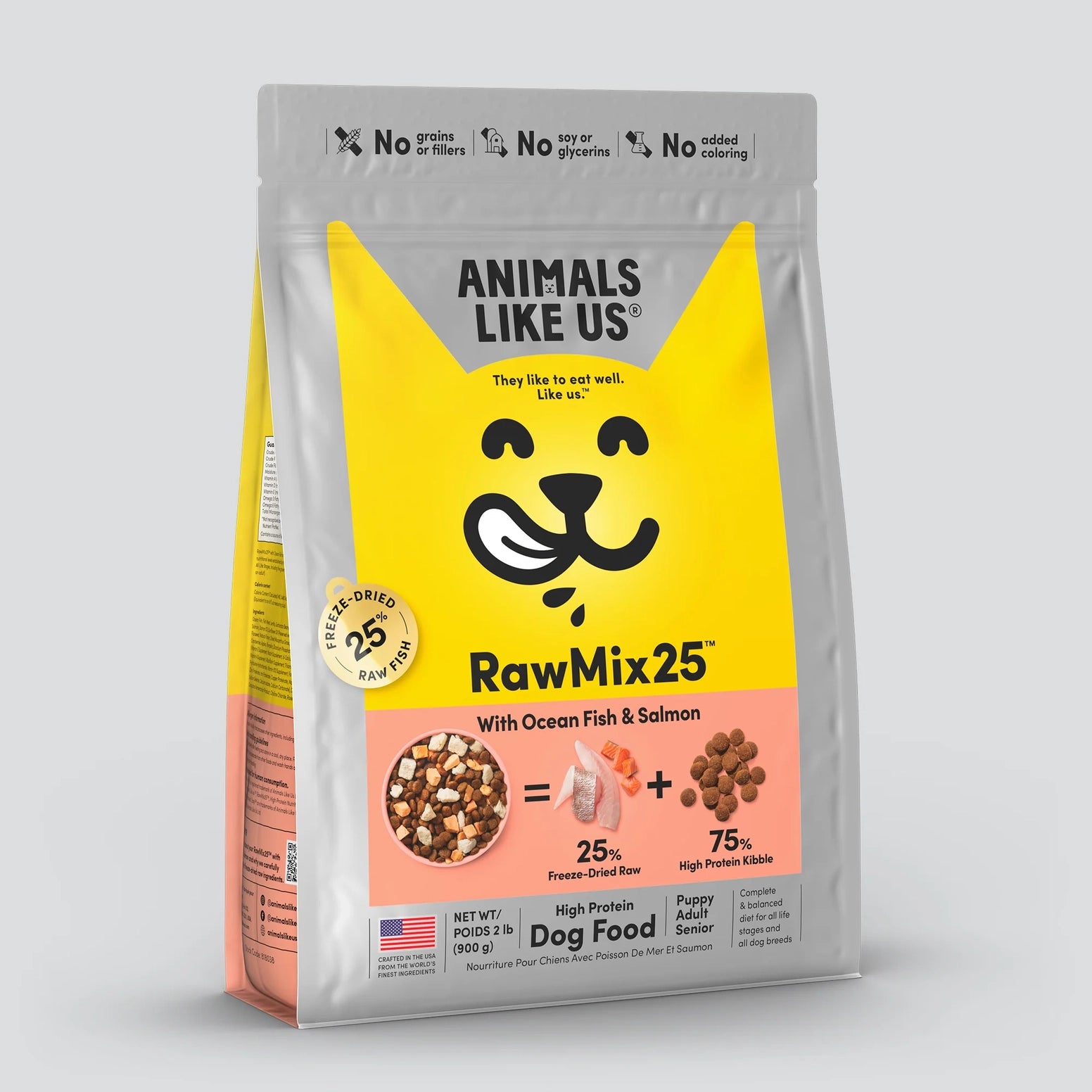 Yellow and gray stand-up pouch of freeze-dried raw dog food featuring ocean fish and salmon pieces with kibble mix