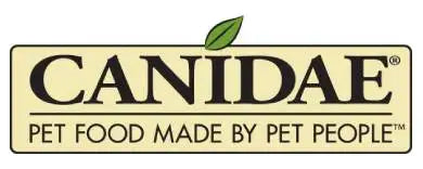 Canidae pet food, packaged in a beige rectangular box with black lettering and a green leaf emblem above the brand name.