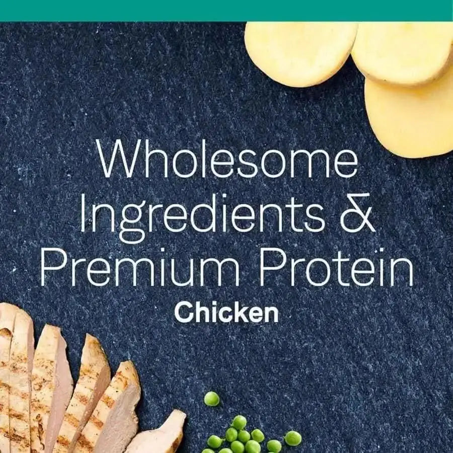 Grilled chicken, green peas, and potato slices spotlight CANIDAE PURE Elements Formula with Chicken Limited Ingredient Dry Cat Food—premium, grain free nutrition. Wholesome Ingredients & Premium Protein. Chicken featured at the center.