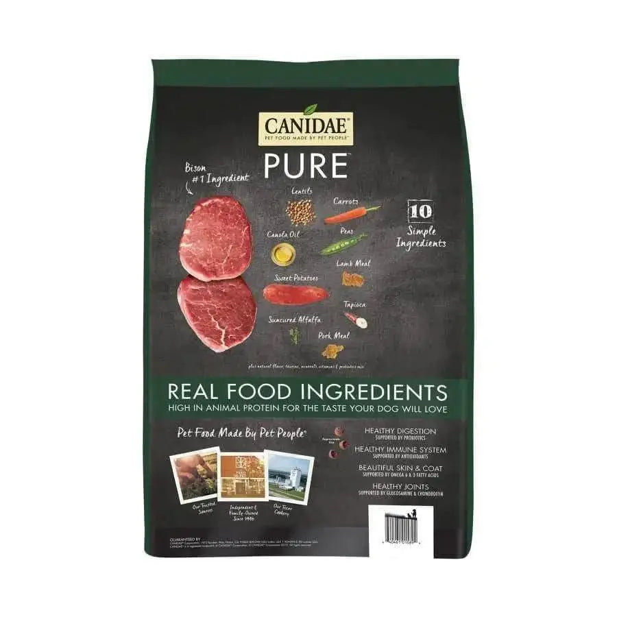 Front of a CANIDAE PURE Grain-Free Real Bison, Lentil & Carrot Recipe Dry Dog Food bag, highlighting 10 simple real food ingredients in this limited ingredient formula.