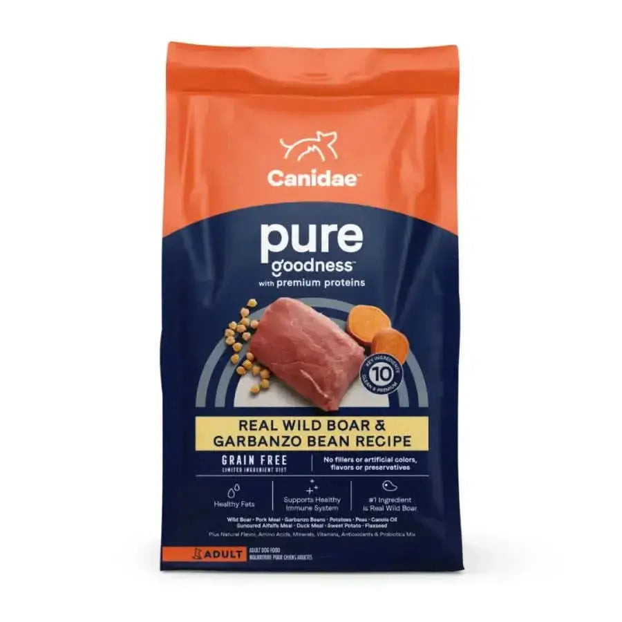 A bag of CANIDAE PURE Grain-Free Real Wild Boar & Garbanzo Bean Recipe Top Dry Dog Food, in orange and navy packaging, ideal for adult dogs with sensitivities.