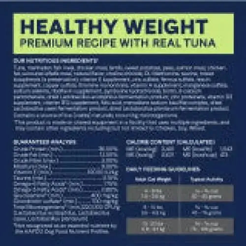 A CANIDAE PURE Ocean Indoor Formula with Tuna Limited Ingredient Dry Cat Food label displays nutritional information, guaranteed analysis, feeding guidelines by cat weight, and calories per cup on a dark background.