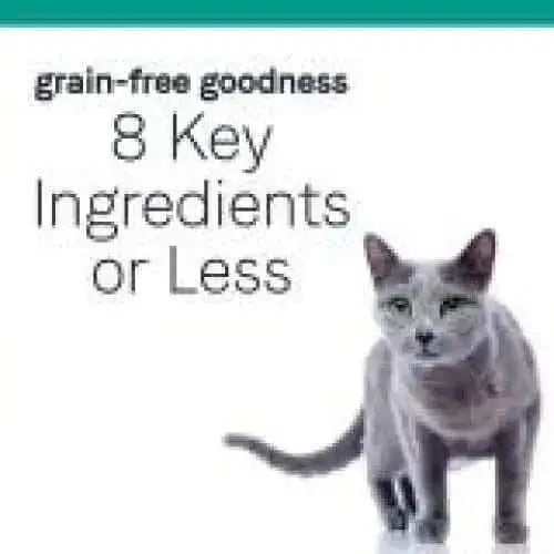 A gray cat stands to the right beneath text: CANIDAE PURE Ocean Indoor Formula with Tuna—Limited Ingredient, Grain-Free Cat Food for Sensitive Cats on a white background.