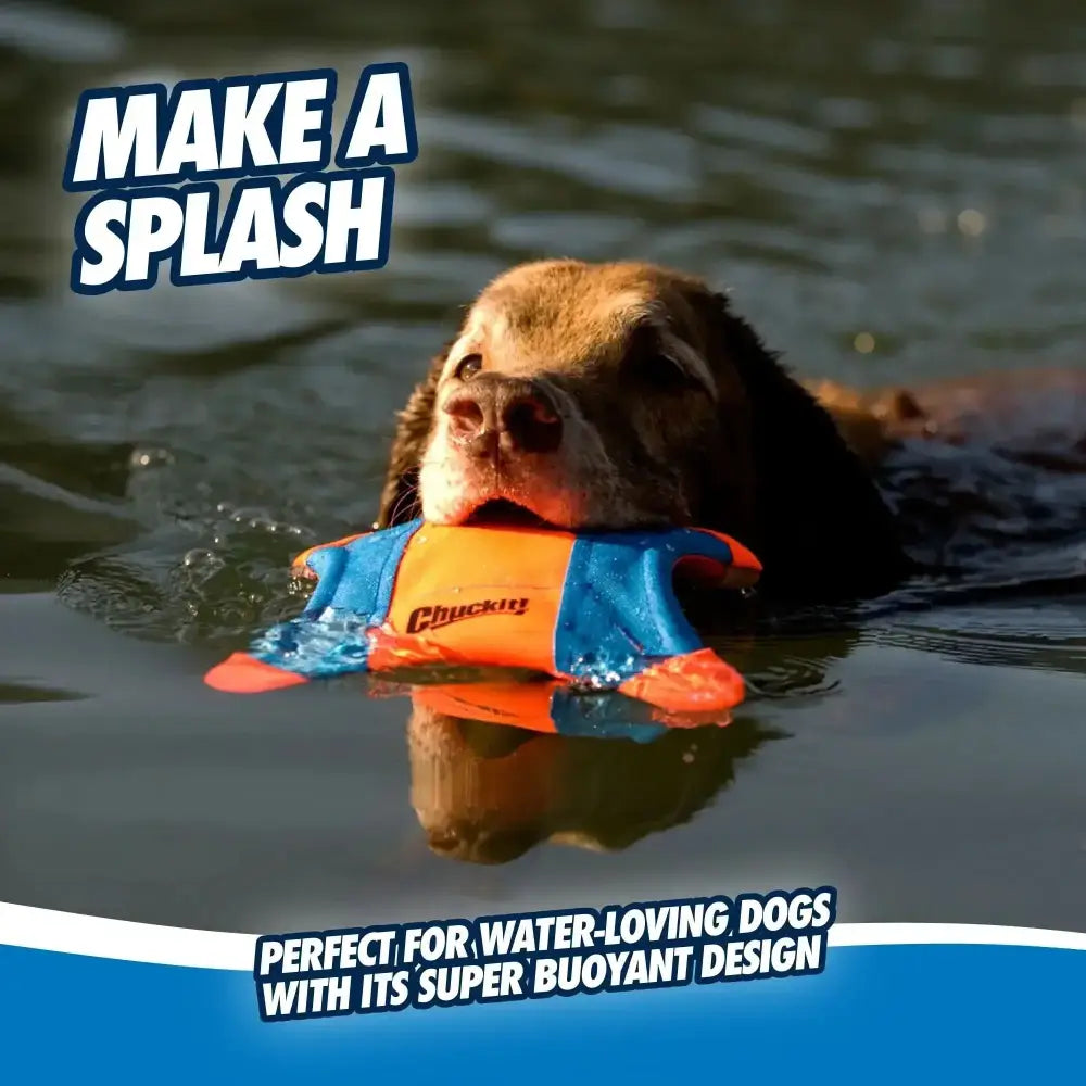 A dog swims in water holding a Chuckit!® Flying Squirrel Dog Toy in orange/blue. Text reads: MAKE A SPLASH—Ideal for water-loving pups, this Chuckit!® toy features a super buoyant design for aquatic fun.