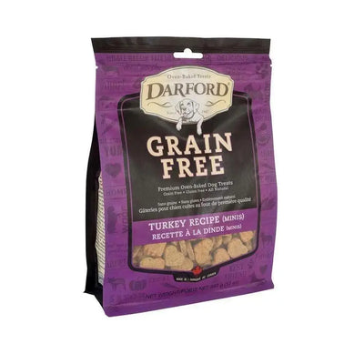 A 12 oz purple and black bag of Darford® Grain Free Turkey Minis Dog Treats features product info, the Darford brand, and a clear window displaying the small, bone-shaped grain-free turkey treats inside.