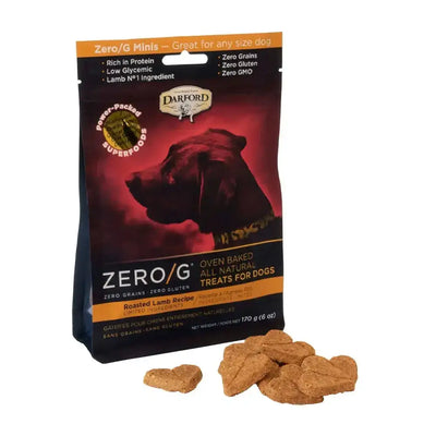 A bag of Darford® ZERO/G Minis Roasted Lamb Oven Baked Dog Treats 6 Oz is shown with heart-shaped treats in front. The packaging features a dog silhouette and highlights their grain free, limited ingredient formula.