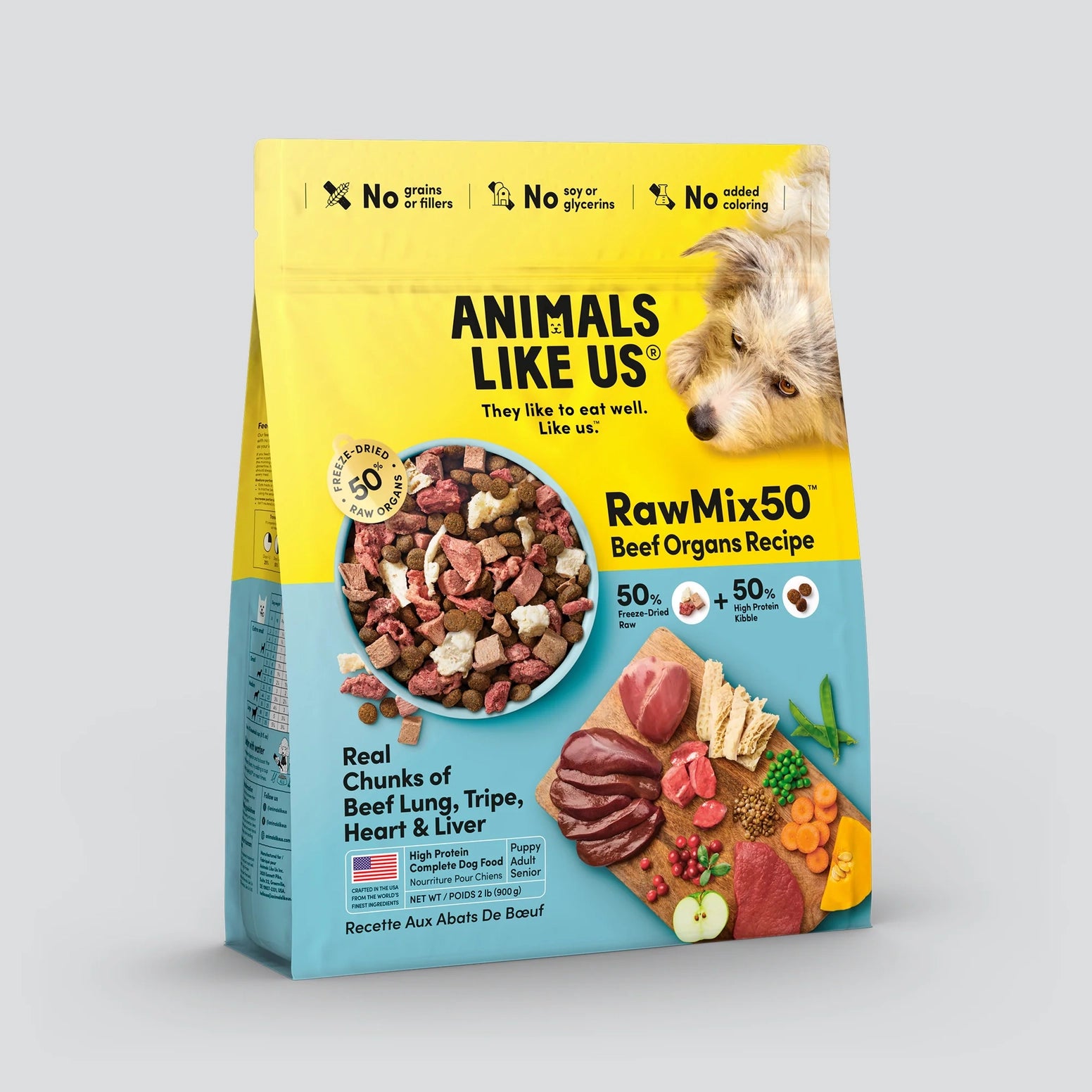Front view of a yellow and blue bag of freeze-dried raw beef organ dog food with chunks and fresh ingredients displayed