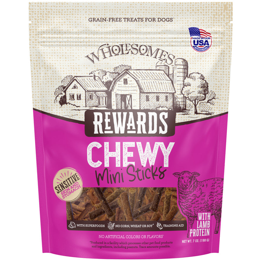 Wholesomes Rewards Chewy Lamb Sticks dog treats in a colorful bag, featuring a farm illustration and highlighting grain-free,