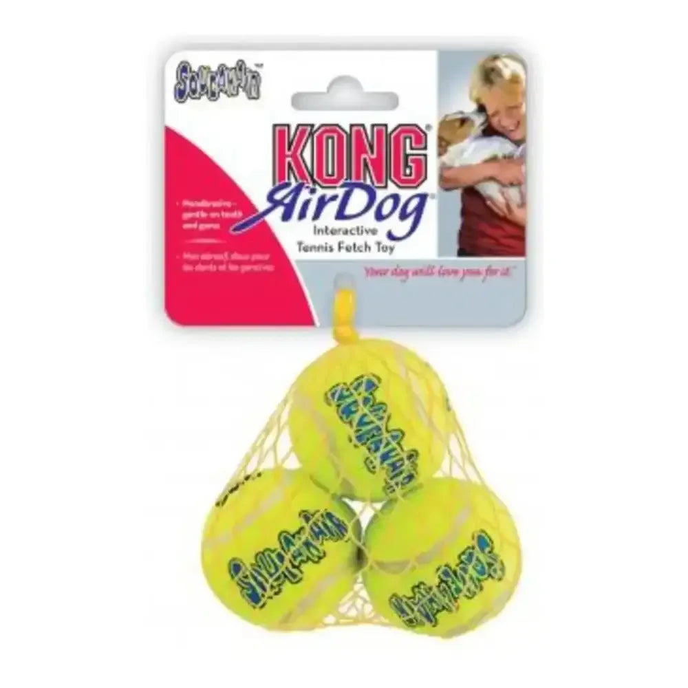 Three yellow KONG SqueakAir tennis balls in a mesh bag with product packaging.