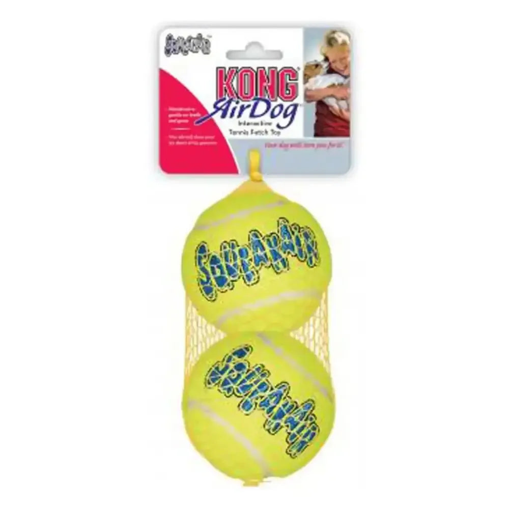 Two yellow KONG SqueakAir tennis balls for dogs in a mesh bag with cardboard packaging.
