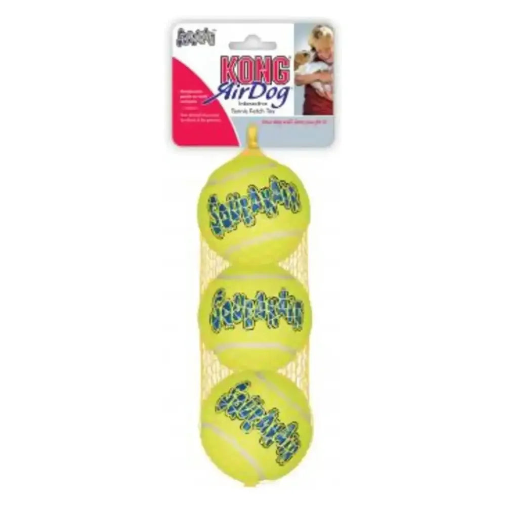 Three yellow KONG SqueakAir tennis balls for dogs in a mesh bag with cardboard packaging.