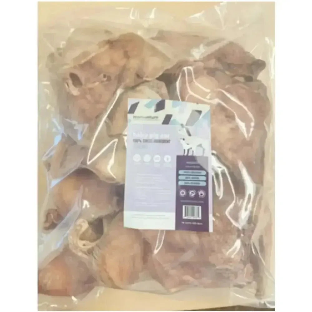 Momentum Carnivore Nutrition 18ct freeze-dried pig ear dog chews in a clear resealable bulk bag for dental health.