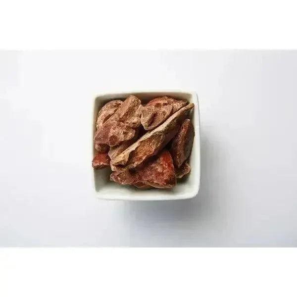 Overhead view of Momentum freeze-dried turkey liver cat treats, a single-ingredient grain-free snack in a white ceramic bowl.