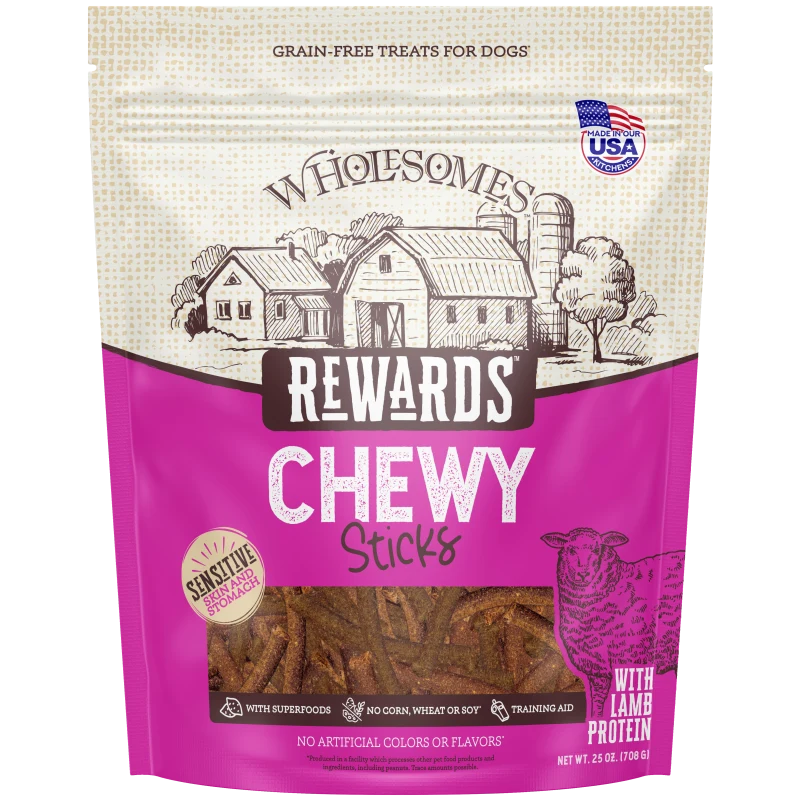 Talis Us Wholesomes Rewards Chewy Lamb Sticks dog treats in a pink bag, featuring a farm scene and a lamb graphic.