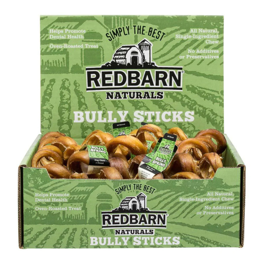A display box of Redbarn Naturals Bully Springs, spiral-shaped all-natural dog chews.