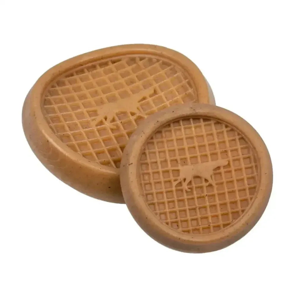 Two tan, waffle-textured Tall Tails Wiggle Waffle Chew Dog Toys in 4 inch and 5.5 inch sizes.